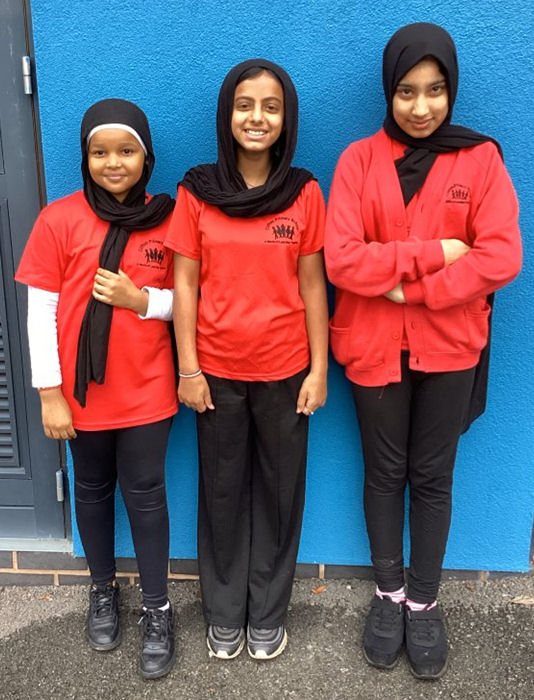 Girls wearing our school uniform