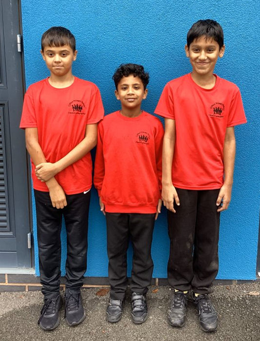 Boys wearing our school uniform
